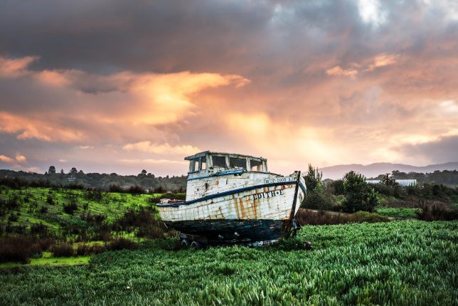 Fishing boat in a field